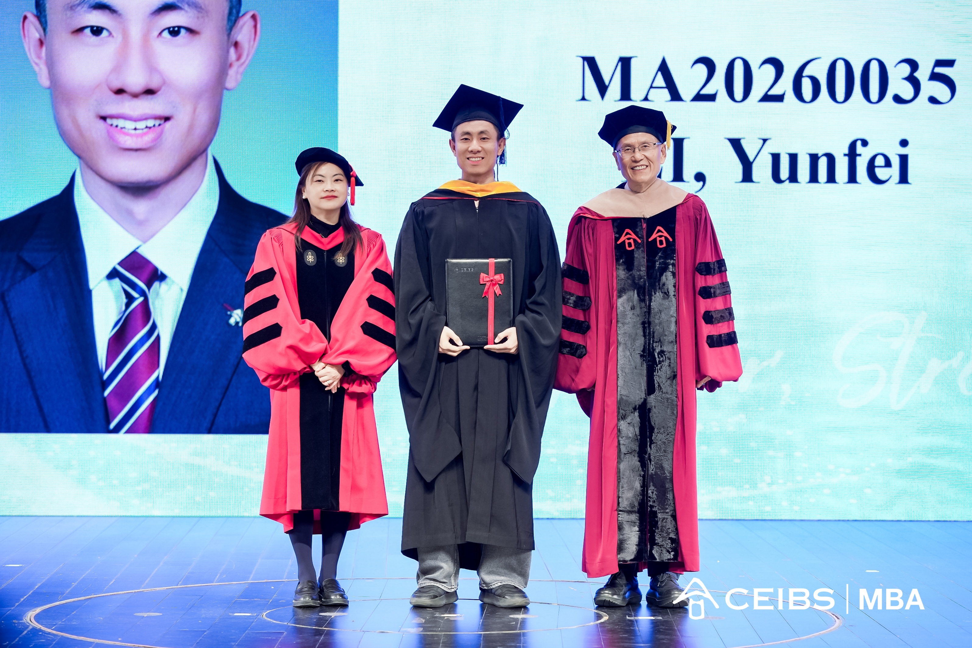 Professors present graduation certificates  to graduates