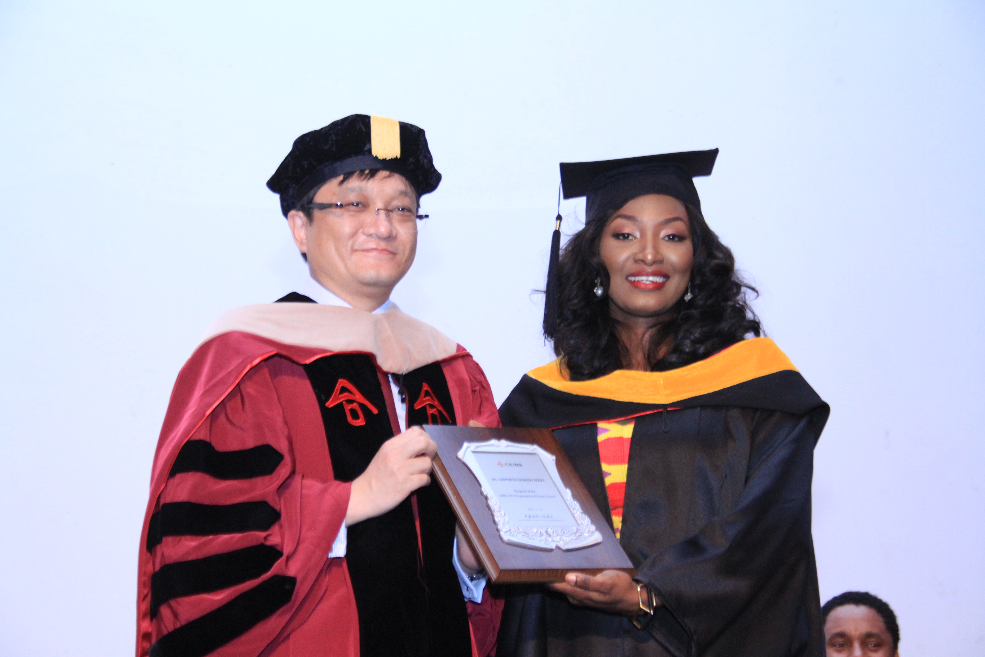 Gwen Addo receiving her graduation certificate